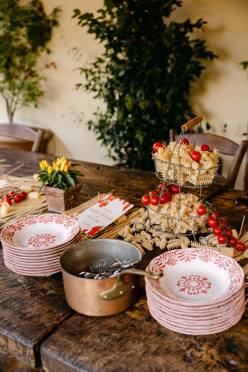 Tuscan cooking experience with pasta and tomatoes at Il Podere di Toscana