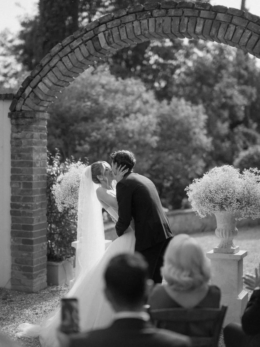 Wedding ceremony under the arch at Il Podere di Toscana Tuscany