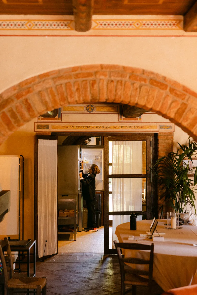 Brick arch kitchen at Il Podere di Toscana — women's culinary retreat Tuscany